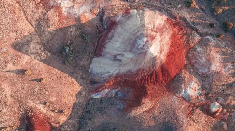 Aerial view of red and white banded terrain