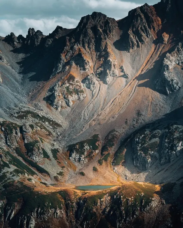 Glacial river braiding across a mountain valley